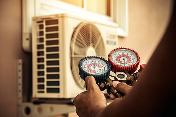 Professional Emergency Hvac technician working in Van Meter, IA